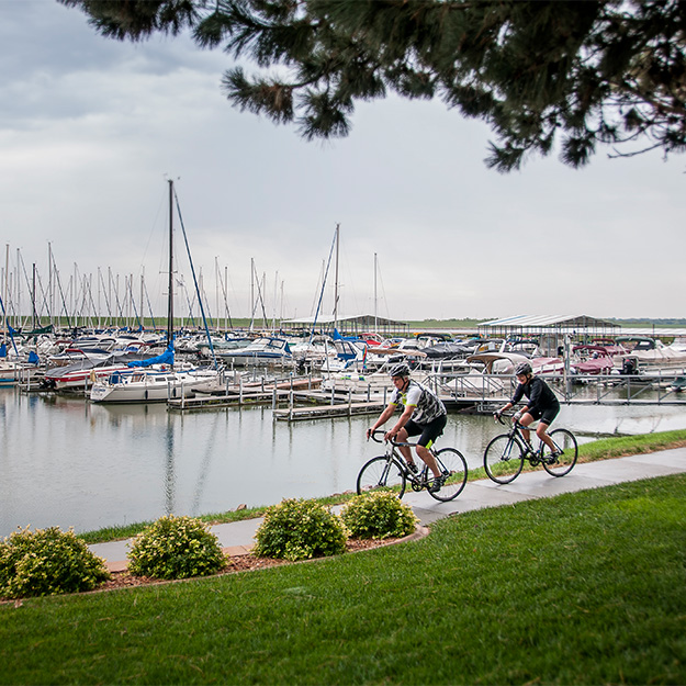 man and woman riding bikes